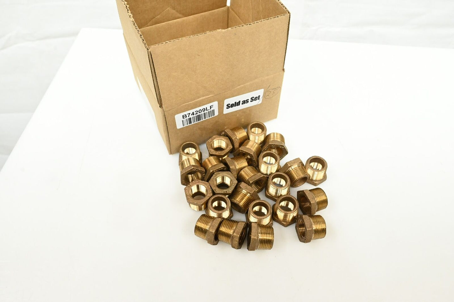 Jones Stephens B74209LF 3/4" x 1/4" Bronze Hex Bushing (Lead Free), PK 25